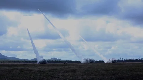 M142 High Mobility Artillery Rocket Systems HIMARS launching in succession Stock Footage 112328328