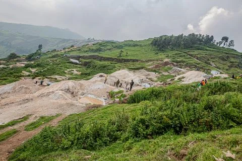 M23 rebels stand inside the coltan mining area in Rubaya Stock Photos