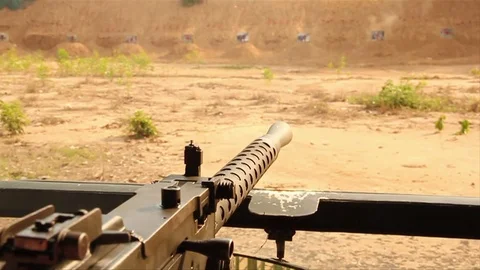 M30 - 3 short bursts from behind POV Stock Footage 75838082