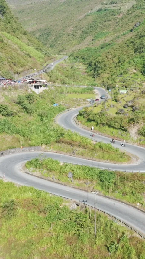 Ma Pi Leng Pass, Ha Giang, Ha Giang, Vietnam. Mountain road with motorbikes., Video stock 329255892