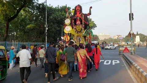 Maa kali heading towards the ganges for immersion at calcutta Stock Footage 172369390