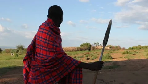 Maasai Warrior Protecting his Homestead. Stock Footage