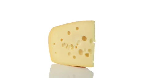 Maasdam cheese on rotating table, isolated on white, 4K Stock Footage 259090151