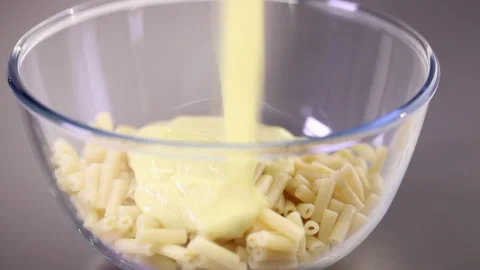 Mac and Cheese pasta pour 1 Stock Footage 280113877