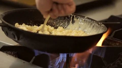 Mac and cheeze being cooked Stock Footage 109393748
