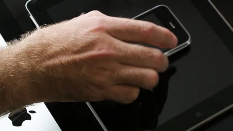 Mac Computer with iPad tablet and iPhone 3gs Apple MacOS on iMac computers Stock Footage 107783796