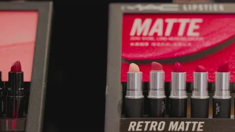 MAC Cosmetics lipstick on the stand. MAC lipstick testers displayed in a Stock Footage 171486194