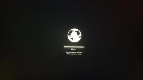 Mac Internet Recovery Process Displayed on Screen with Progress Bar Stock Footage 334704066