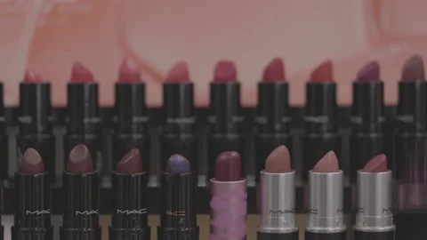MAC lipstick on the stand. MAC lipstick testers displayed in a luxurious store Stock Footage 171482801