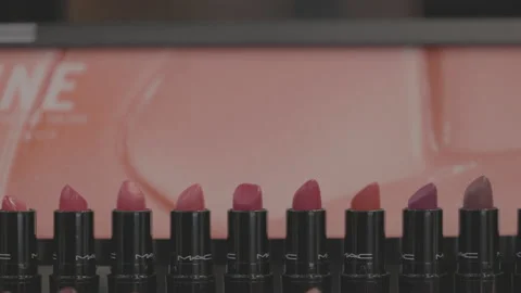 MAC lipstick on the stand. MAC lipstick testers displayed in a luxurious store Stock Footage 171483402