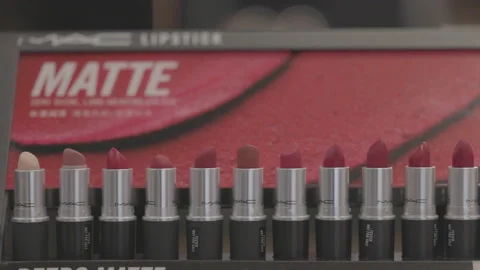 MAC lipstick on the stand. MAC lipstick testers displayed in a luxurious store Stock Footage 171485909