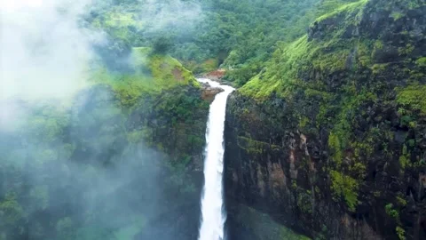 Mac Mac Waterfalls in lush rainforest (Aerial View) Stock Footage 282072877