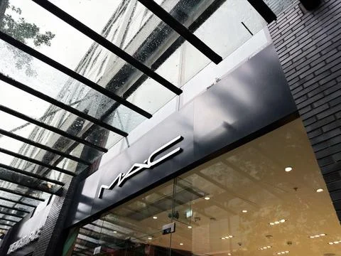 MAC store front under rainy glass canopy in Liverpool UK showing modern sho.. Stock Photos