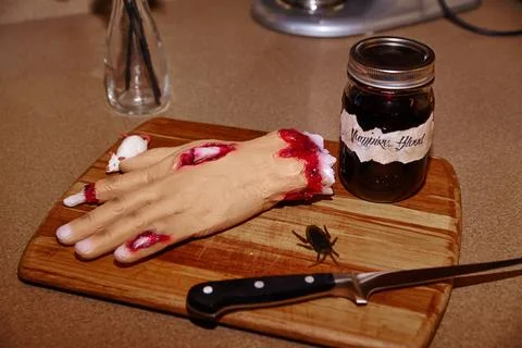 Macabre Culinary Scene with Vampire Theme in Domestic Kitchen Photos