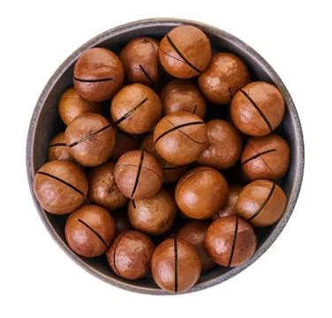 Macadam nuts in bowl with clipping path Stock-Fotos