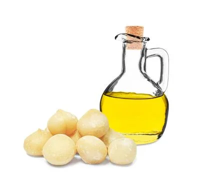 Macadamia nut oil Stock Photos