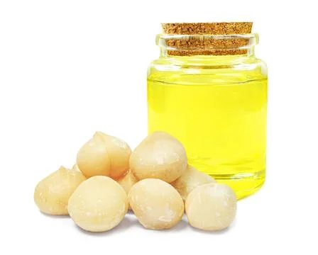 Macadamia nut oil Stock Photos