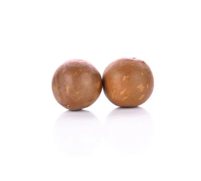 Macadamia nuts isolated on white background Stock Photos