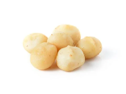 Macadamia nuts isolated on white background Stock Photos