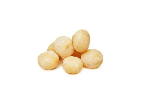 Macadamia nuts isolated on a white background Stock Photos