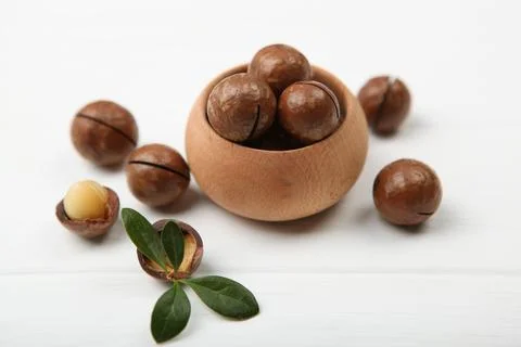 Macadamia nuts on the table Stock Photos