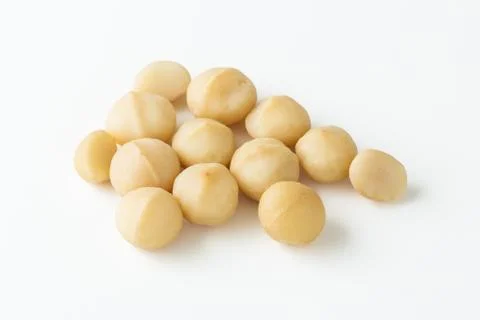 Macadamia nuts on white background 스톡 사진
