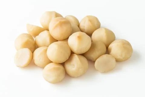 Macadamia nuts on white background Stock Photos