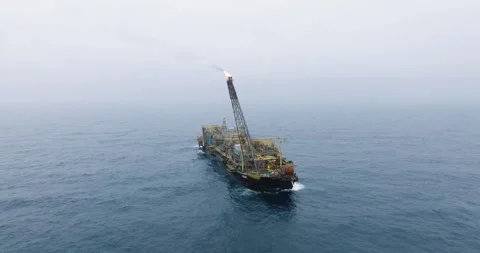 Macao, Brazil - 01 August 2024: Aerial view of industrial vessel in ocean, Stock Footage 284814397