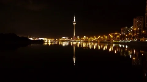 Macao Tower at night with Reflection in Water - Wide shot -Time lapse Stock Footage 82859364