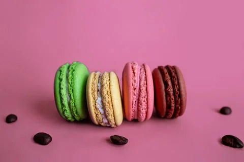 Macaron Cakes Or Macaroon On Colored pink fuksia Background Stock Photos