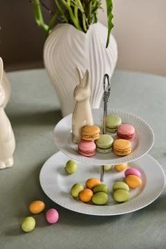 Macaron Cookies on Stand with Easter Rabbit Stock Photos