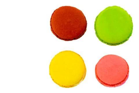 Macaron or macaroon on white background,. Colorful almond cookies on dessert  Stock Photos