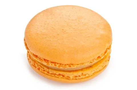 Macaron orange cookie isolated on a white background. French confection. Stock Photos