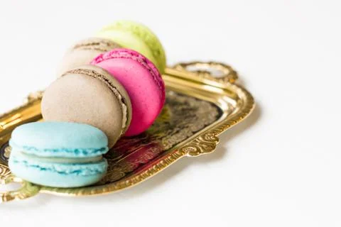 Macaron on a Plate and White Background Stock Photos