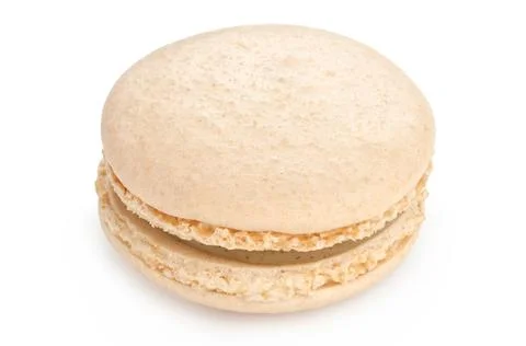 Macaron vanilla cookie isolated on a white background. French confection. Stock Photos
