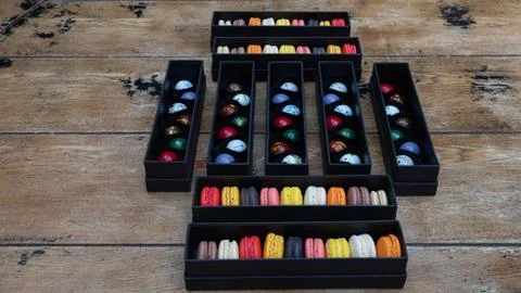 Macarones pack on wooden table background Foto stock