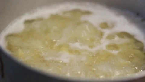 Macaroni and spaghetti are cooked in the pan Stock Footage 71114375