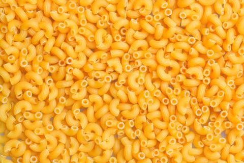 Macaroni angle pasta closeup Stock Photos