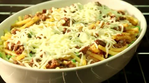 Macaroni bake in the oven (time lapse) 스톡 동영상 24673274