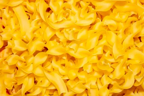 Macaroni cones.Macaroni background top view.The texture of the pasta. Stock Photos