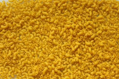 Macaroni crayons as a background Stock Photos