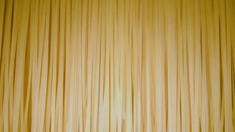 Macaroni cutting operation on an industrial machine. Stock Footage 84791752