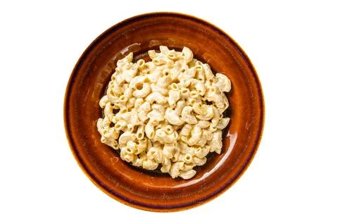 Macaroni Mac and cheese with Cheddar sauce in a plate. Isolated, white back.. Stock Photos