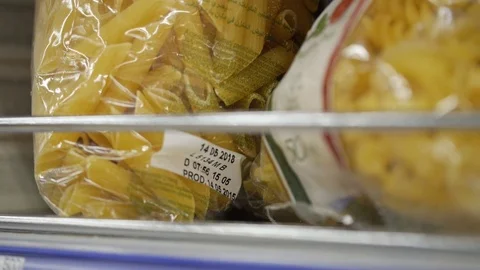 Macaroni in the package on the store counter Stock Footage 75218582