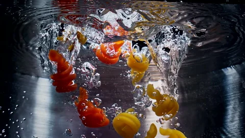 Macaroni Pasta Falling Down in to the pot Super Slow motion 1000 fps Stock Footage 130912629