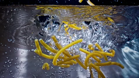 Macaroni Pasta Falling Down in to the pot Super Slow motion 1000 fps Stock Footage 130914018