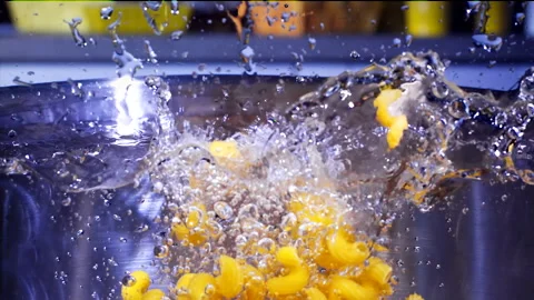 Macaroni Pasta Falling Down in to the pot Super Slow motion 1000 fps Stock Footage 130916990