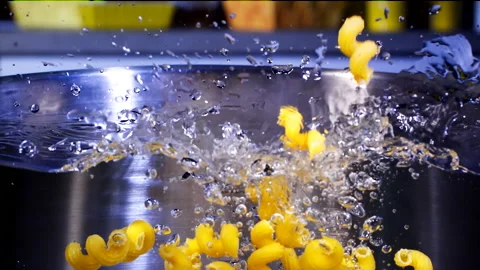 Macaroni Pasta Falling Down in to the pot Super Slow motion 1000 fps Stock Footage 130917910