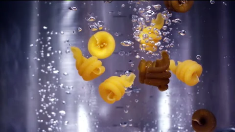 Macaroni Pasta Falling Down in to the pot Super Slow motion 1000 fps Stock Footage 130918329