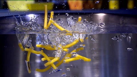 Macaroni Pasta Falling Down in to the pot Super Slow motion 1000 fps Stock Footage 130922519